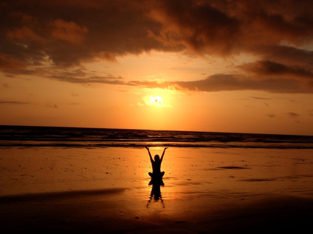 yoga en la playa